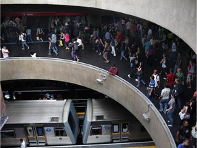 Passengers are seen at a subway station in downtown Sao Paulo, Brazil.