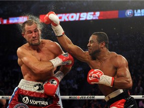 Jean Pascal (right) lands a head shot to Sergey Kovalev during their unified light heavyweight championship bout at the Bell Centre on March 14, 2015.