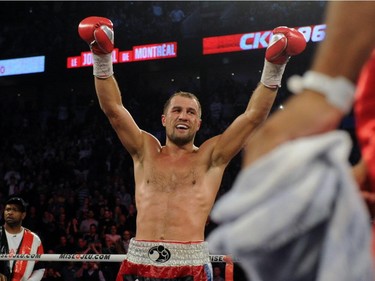Sergey Kovalev celebrates after defeating Jean Pascal (not pictured) during their Unified light heavyweight championship bout at the Bell Centre on March 14, 2015 in Montreal, Quebec, Canada.