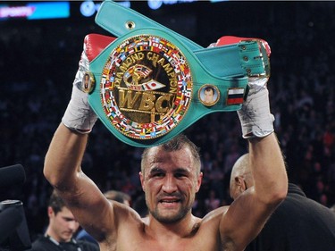 Sergey Kovalev stands with the WBC Light Heavyweight belt after defeating Jean Pascal (not pictured) during their Unified light heavyweight championship bout at the Bell Centre on March 14, 2015 in Montreal, Quebec, Canada.