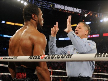 Jean Pascal gets the standing count after falling in the third round during the unified light heavyweight championship bout against Sergey Kovalev at the Bell Centre on March 14, 2015 in Montreal, Quebec, Canada.