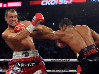 Jean Pascal (right) lands a punch to the head of Sergey Kovalev during their unified light heavyweight championship bout at the Bell Centre on March 14, 2015 in Montreal, Quebec, Canada.
