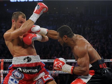 Jean Pascal (right) lands a punch to the head of Sergey Kovalev during their unified light heavyweight championship bout at the Bell Centre on March 14, 2015 in Montreal, Quebec, Canada.