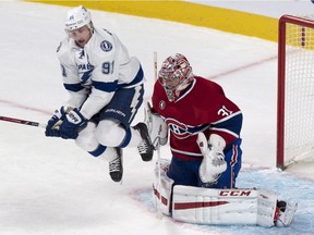 The Tampa Bay Lightning's Steven Stamkos screens Canadiens goalie Carey Price during game at the Bell Centre in Montreal on Jan. 6, 2015. The Canadiens lost 4-2.