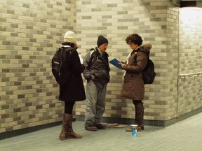 Sue Montgomery (right) and a member of her team question a man inside Place des Arts métro station during Montreal's first homeless count, on March 24, 2015. Credit:  Special to the Montreal Gazette