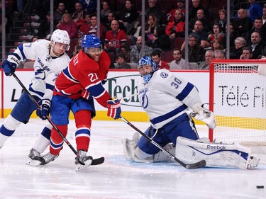 Devante Smith-Pelly shoots the puck wide on goalie Ben Bishop of the Tampa Bay Lightning  at the Bell Centre on Tuesday, March 10, 2015.