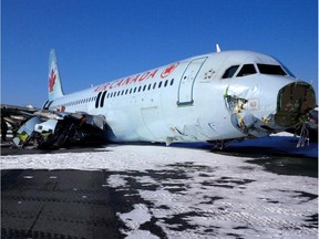 This photo provided by the Transportation Safety Board of Canada shows a Air Canada Airbus A-320 at Halifax International Airport after making an "abrupt" landing and skidding off the runway in bad weather early Sunday, March 29, 2015. Officials said 23 people were taken to a hospital for observation and treatment of minor injuries, none of which were considered life threatening.