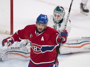 Canadiens' Tomas Plekanec celebrates after scoring on San Joes Sharks goaltender Antti Niemi during first period NHL hockey action in Montreal, Saturday, March 21, 2015.