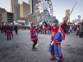 Habs fans dance at the Montreal Canadiens' Fan Jam prior to game one of the playoff series against the Ottawa Senators in Montreal on Wednesday, April 15, 2015.