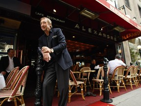 Alain Creton on the sidewalk terrasse of his Chez Alexandre pub on Peel St.