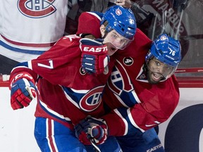 Canadiens' Alex Galchenyuk, left, celebrates his winning goal with P.K. Subban as the Habs beat the Senators 3-2 in overtime Friday night at the Bell Centre.