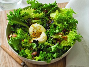An anchovy-favoured dressing zaps up this chicory salad, which is then topped with a poached egg.