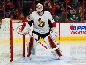 Ottawa Senators goalie Andrew Hammond scrapes the crease during game against the Flyers on April 11, 2015, in Philadelphia.