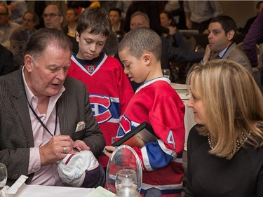 AUTOGRAPH TIME: Sports Celebrity of the Year and former Canadiens star Pete Mahovlich makes the day of some adoring young fans at the Cummings Jewish Centre for Seniors Foundation's 11th Annual Sports Celebrity Breakfast.