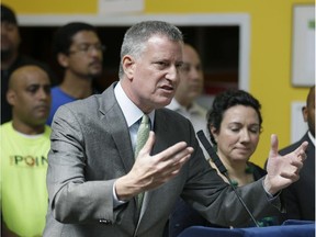 New York City mayor Bill de Blasio speaks during a news conference in the Bronx in New York, Wednesday, April 22, 2015. New York City, in a far-reaching effort to limit its impact on the environment, marked Earth Day on Wednesday by announcing a plan to reduce its waste output by 90 percent by 2030.