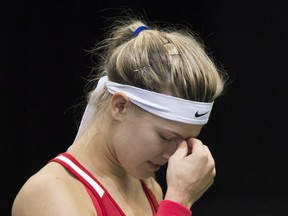 Canada's Eugenie Bouchard reacts during her Federal Cup tennis match against Romania's Alexandra Dulgheru in Montreal, Saturday, April 18, 2015.