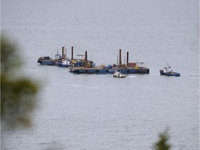 Two barges conduct seismic tests in the St-Lawrence river, off Cacouna village, September 23, 2014 in order to build an oil terminal for TransCanada that would start operating in 2018.