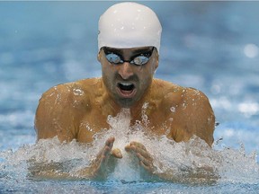 Canada's Benoît Huot competes in the men's 200m Individual Medley SM10 category at the 2012 Paralympics Olympics, Thursday, Aug. 30, 2012, in London.