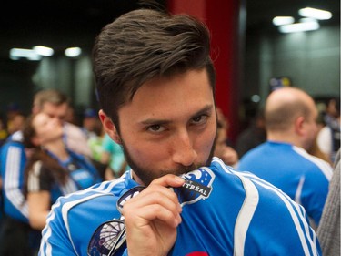 Christian Beltran kisses the Montreal Impact logo prior to the start of the final game of CONCACAF Champions League final between Montreal Impact and Club America from Mexico City, in Montreal Wednesday, April 29, 2015.