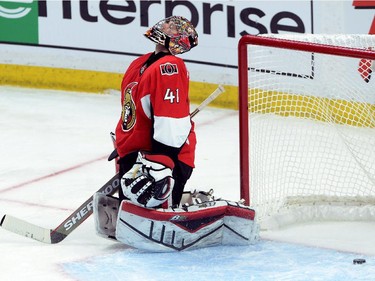 Ottawa Senators goalie Craig Anderson reacts after Montreal Canadiens forward Dale Weise's game-winning goal slipped past him in sudden death overtime of game 3 of first round Stanley Cup NHL playoff hockey action in Ottawa on Sunday, April 19, 2015. The Canadiens defeated the Senators 2-1.