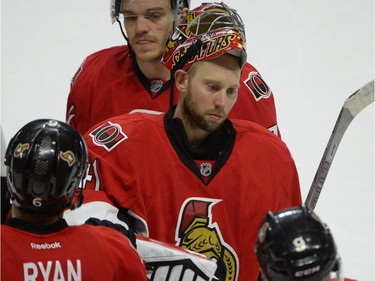 Ottawa Senators' goaltender Craig Anderson (41) leaves the ice after the end of the third period of an NHL Stanley Cup playoff hockey game against the Montreal Canadiens, Sunday April 26, 2015, in Ottawa.THE CANADIAN PRESS/Justin Tang