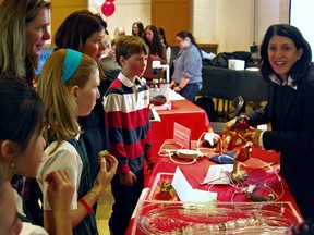 Dr. Nadia Giannetti, chief of cardiology at the McGill University Health Centre, demonstrates the workings of the heart system to students at the March 27 announcement of results of the third annual Toonie Challenge.