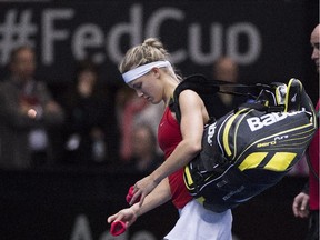 Westmount's Eugenie Bouchard walks off the court after losing her Fed Cup tennis match to Romania's Andreea Mitu in Montreal on April 19, 2015.