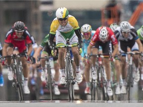 Simon Gerrans from Australia pulls ahead of the pack to win the Montreal Grand Prix Cycling race in Montreal Sunday, September 14, 2014.