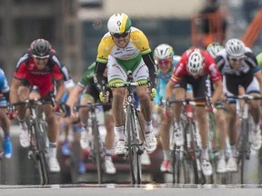 Simon Gerrans from Australia pulls ahead of the pack to win the Montreal Grand Prix Cycling race in Montreal on Sept. 14, 2014.