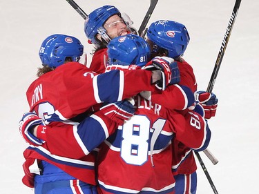 Habs celebrate Lars Eller's goal during second-period action in Montreal on Wednesday, April 15, 2015.