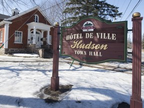 Hudson town council delayed making a decision on a transfer of land from a developer.