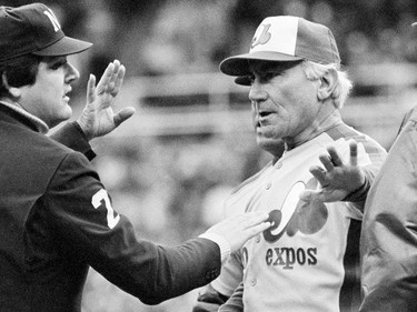 Montreal Expos manager Jim Fanning, center, files an official game protest with home plate umpire Bruce Froemming, left, during a division playoff game against the Philadelphia Phillies in Philadelphia, Pa. on Oct. 9, 1981.