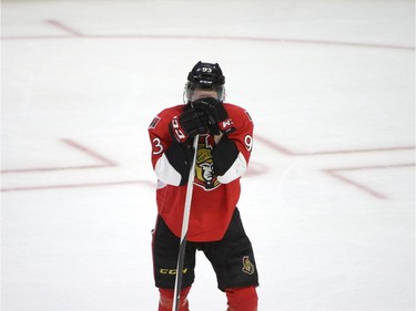Ottawa Senators' Mika Zibanejad (93) stands on the ice at the end of the third period of an NHL Stanley Cup playoff hockey game against the Montreal Canadiens, Sunday April 26, 2015, in Ottawa.