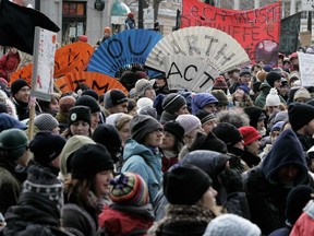 Thousands take part in the Global Climate March in Montreal in April 2015. It's interesting to note that these participants are more bundled up in a Montreal spring than if the march had been held this December.