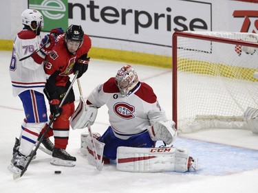 Montreal Canadiens goalie Carey Price makes a save on Ottawa Senators'Mika Zibanejad (93) as Canadiens' P.K. Subban (76) defends during the first period Stanley Cup NHL playoff hockey action in Ottawa on Wednesday, April 22, 2015.