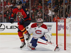 Aleksander Barkov of the Florida Panthers skates in front of goaltender Carey Price of the Montreal Canadiens at the BB&T Center on April 5, 2015, in Sunrise, Fla. The Canadiens defeated the Panthers 4-1.