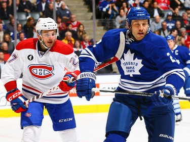 Eric Brewer #2 of the Toronto Maple Leafs gets a high stick by Alex Galchenyuk #27 of the Montreal Canadiens during NHL action at the Air Canada Centre April 11, 2015, in Toronto.