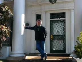 Montreal poet David McGimpsey on the front porch of Graceland in Memphis.