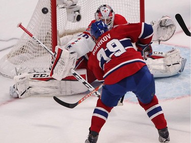 Montreal Canadiens' Andrei Markov shoots wide on Washington Capitals' Braden Holtby, during third period NHL action in Montreal on Thursday April 2, 2015.