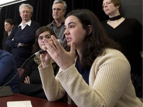 Camille Godbout, right, of the Association pour une solidarité syndicale étudiante, speaks during a press conference in Montreal on Tuesday .