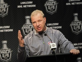 Canadiens coach Michel Therrien answers a question during news conference after practice at the Bell Sports Complex in Brossard on April 14, 2015.