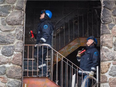 Police arson investigators at the scene of the overnight fire at the Koimisis Tis Theotokou Greek Orthodox Church, also called Panagitsa, in Parc-Extension April 14, 2015.