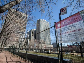 MONTREAL, QUE.: APRIL 15, 2015 -- A view fence around the perimeter of Emile-Gamelin park, which is closed for renovations, in Montreal city hall in Montreal on Wednesday, April 15, 2015. (Dario Ayala / Montreal Gazette)