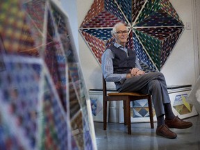 George Russell, a retired high school art teacher and an artist in his home studio in Laval. He has donated his entire oeuvre to the Arthritis Society.