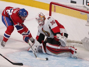 Montreal Canadiens' Brian Flynn scores during second-period action in Montreal on Wednesday, April 15, 2015.