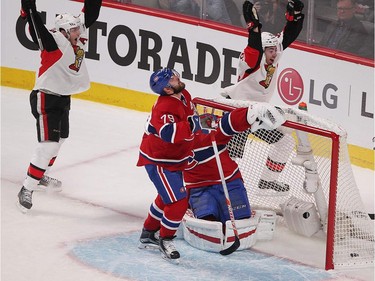Montreal Canadiens' Andrei Markov reacts after scoring an own goal on Carey Price as Ottawa Senators' Bobby Ryan (6) and Mika Zibanejad (93) look on during first-period playoff action in Montreal, Wednesday, April 15, 2015.