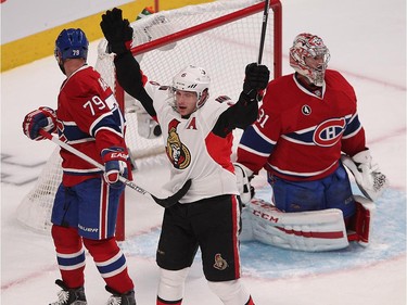 Ottawa Senators' Bobby Ryan celebrates goal by Kyle Turris, not seen, during second-period action in Montreal on Wednesday, April 15, 2015.