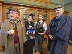 Left to right,  Wilfrid DeFreitas, Maureen Anderson, Bruno Paul Stenson and Paul Billette, members of The Bimetallic Question, gather prior to their bi- monthly meeting at the Westmount Public Library in Westmount, on Thursday, April 2, 2015.