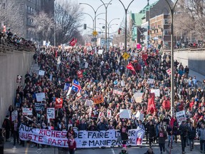 Protesters take part in a large anti-austerity demonstration in Montreal on Thursday, April 2, 2015. The protest combined groups of student associations and unions against what they claim are the austerity programs by the Quebec Liberal government.