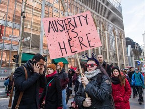 Protesters take part in a large anti-austerity demonstration in Montreal on Thursday, April 2, 2015.